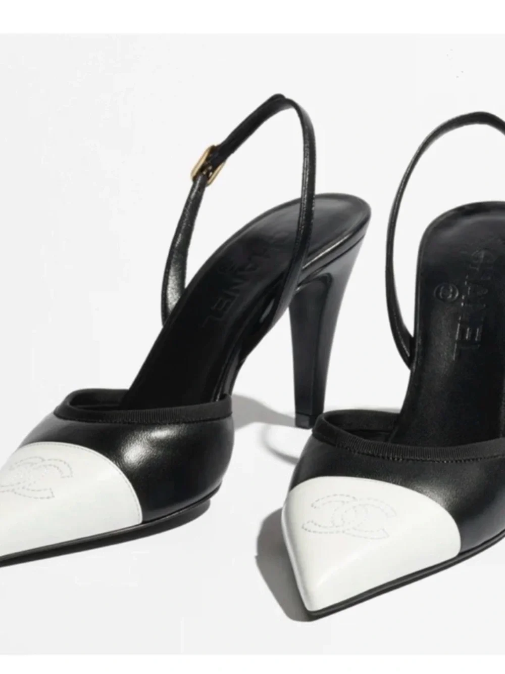 CHANEL Black Leather Slingback Pumps with White Capped Pointed Toe